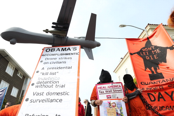 Obamas accomplishments with model drone - SF protest